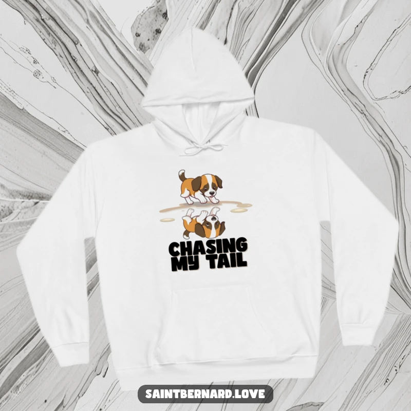 Funny Saint Bernard Hoodie depicting a dog with a rapidly wagging tail, joyfully interacting with its reflection in a puddle.