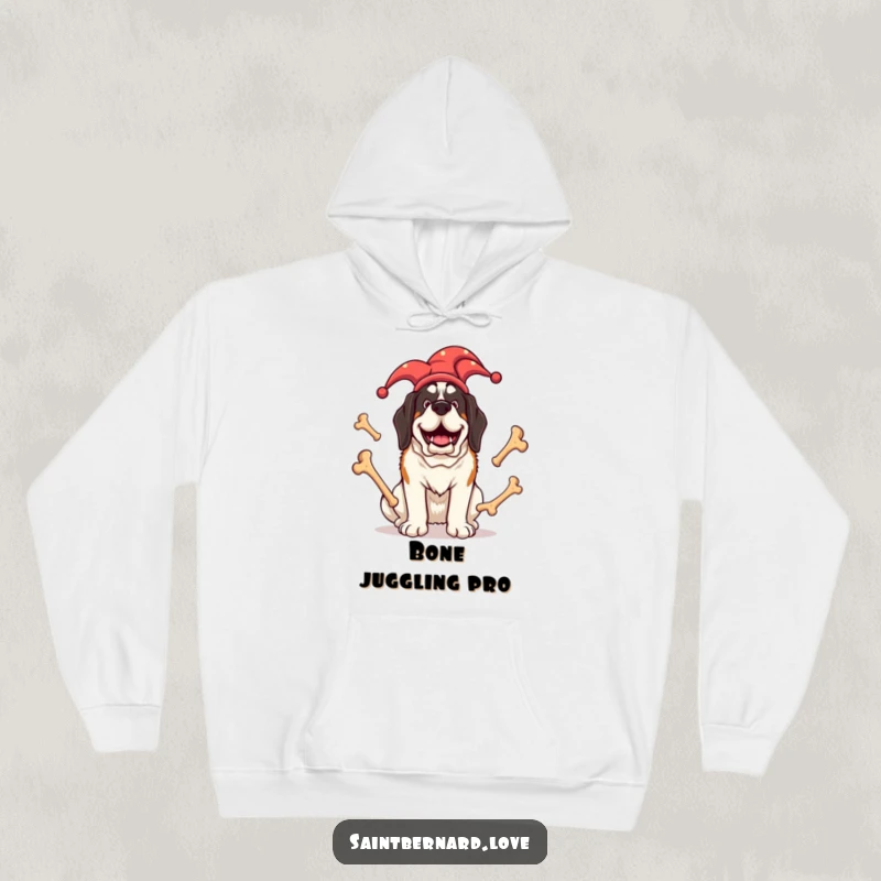 Funny Saint Bernard hoodie with a giant dog wearing a jester hat, skillfully juggling large bones, radiating pure joy and humor.