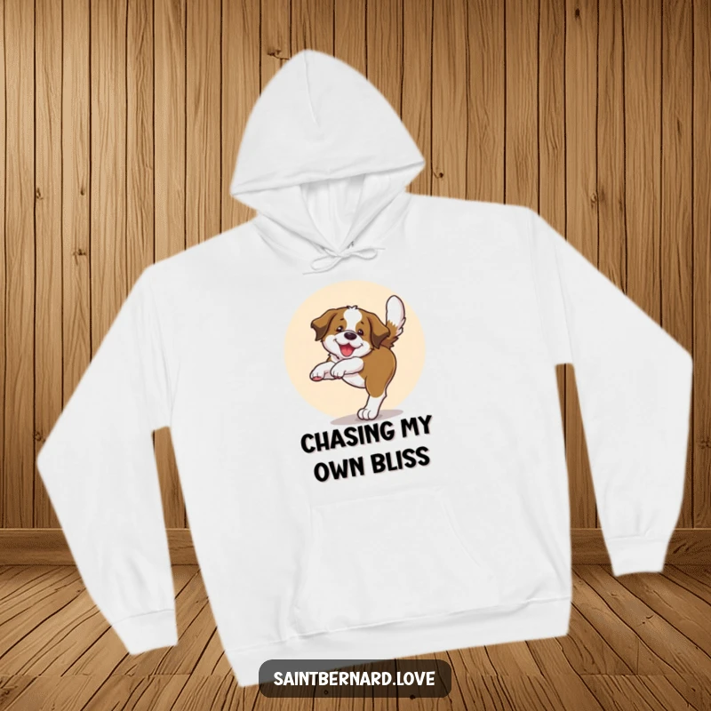 Funny hoodie depicting a Saint Bernard pup in a joyful circle, chasing its tail, offering warmth and adorable charm.