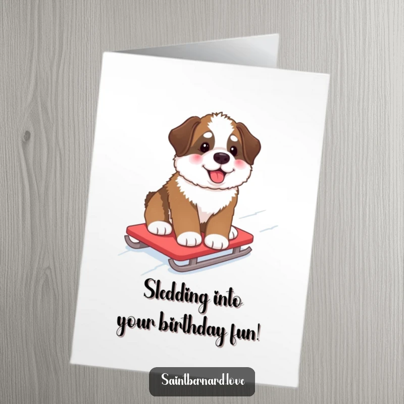 Funny Free Printable Birthday Card: Fluffy Saint Bernard pup with rosy cheeks slides down a snowy hill on a sled.