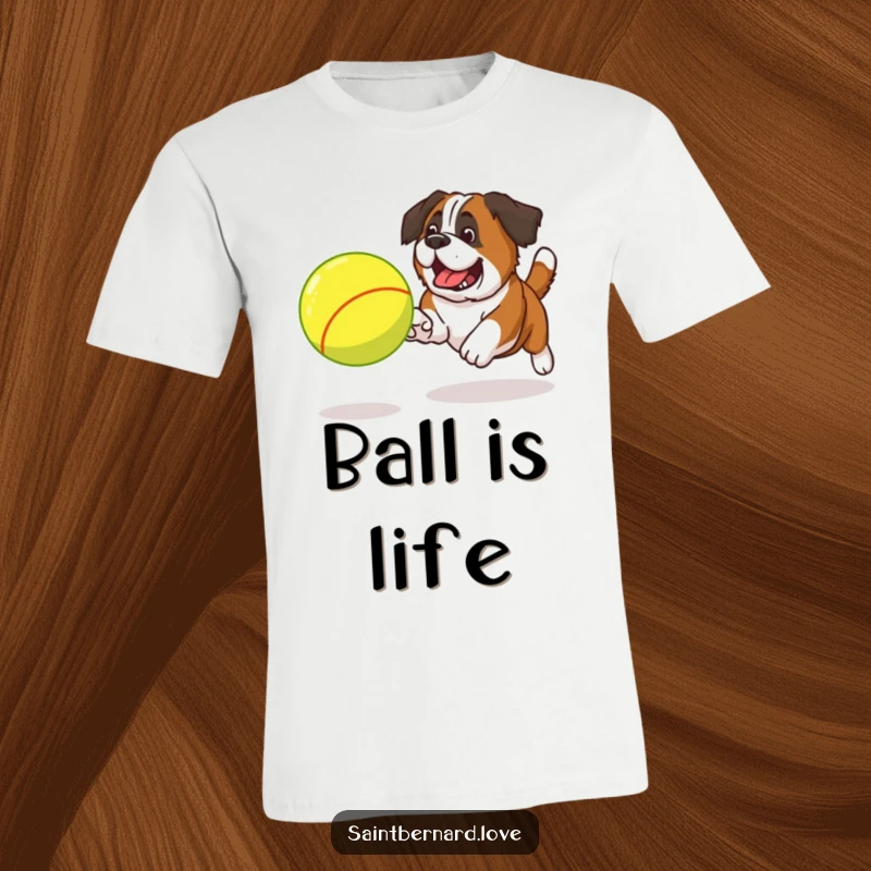 Funny Saint Bernard t-shirt depicting a happy dog enthusiastically chasing a huge, bouncing tennis ball across a field.