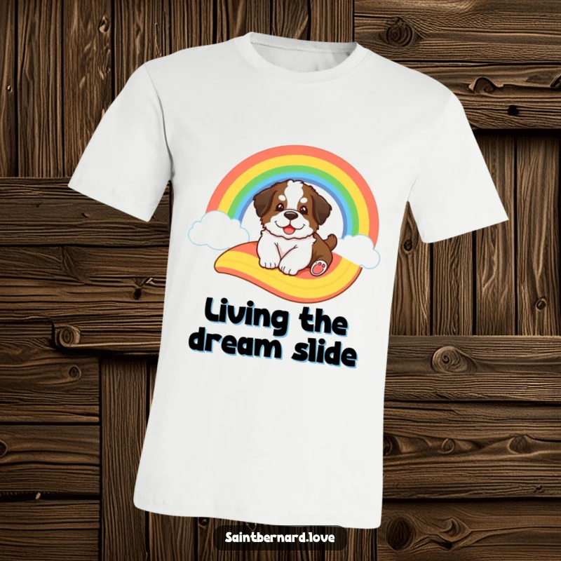 Funny Saint Bernard t-shirt, depicting a big, fluffy puppy happily sliding down a colorful cartoon rainbow with pure delight.