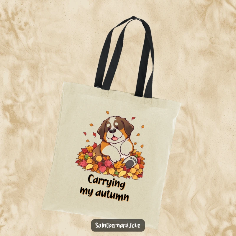 Funny Saint Bernard tote bag showing a large dog having fun rolling in a big pile of autumn leaves, perfect for seasonal shopping.